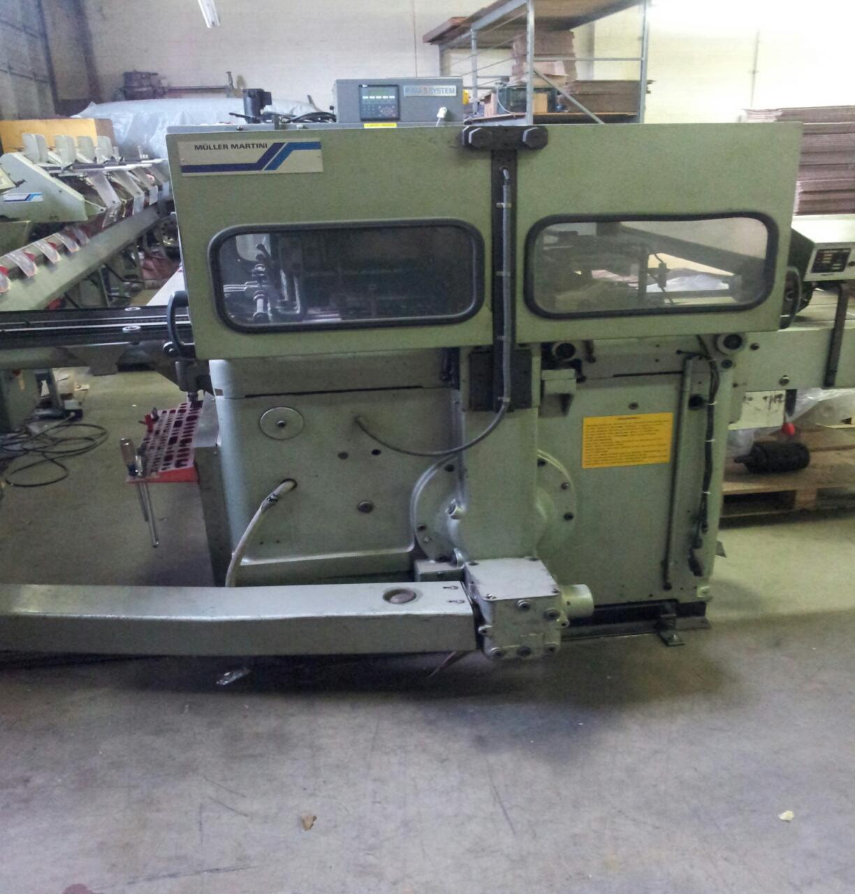 Lot #3: Muller Martini Fox Saddle Stitcher (4 Pocket with Cover Feeder) - WireBids